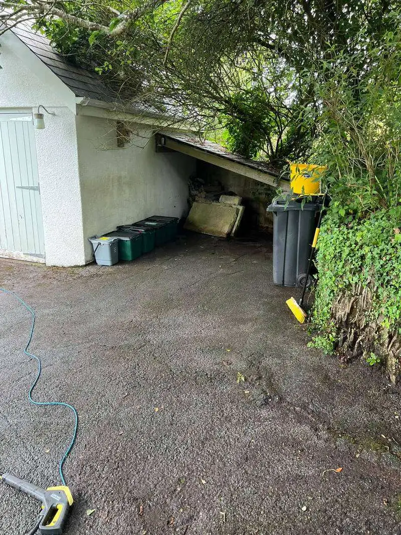 The same driveway after being cleared and pressure-washed