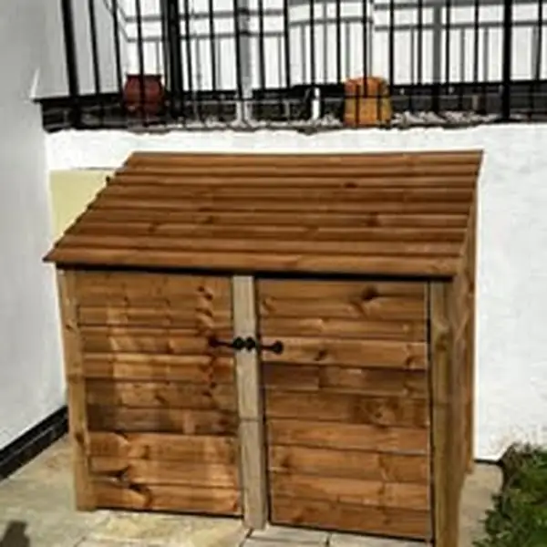 The finished log store with its doors closed
