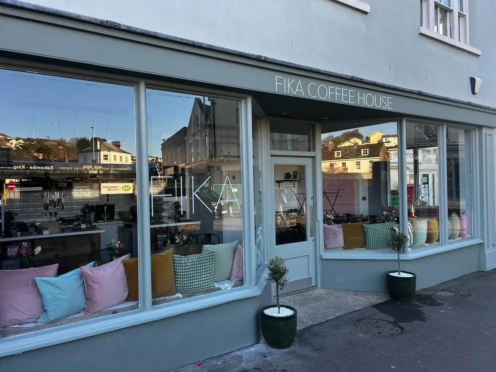 Coffee house shopfront with freshly painted woodwork and large windows